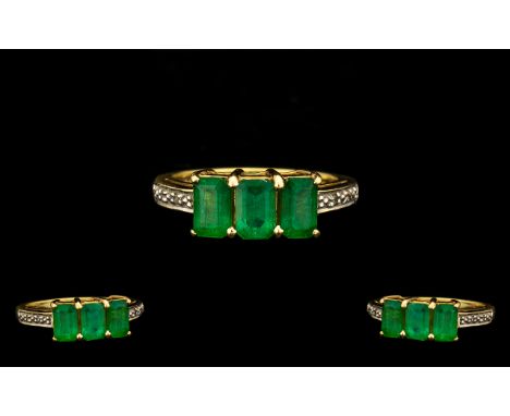 18ct Gold Attractive 3 Stone Emerald Ring - the three faceted step-cut emeralds of good colour. Estimated weight 2.00 cts. Ri