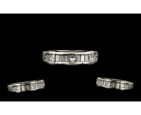 18ct White Gold Contemporary Designed Diamond Set Ring, Set with Baguette Cut and Princes Cut Diamond of Top Grade. Est Diamo