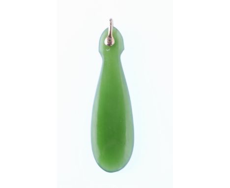 A 15ct gold and nephrite jade pendant. The pendant having a 15ct gold bale with large nephrite drop. Measures 5.5cms.&nbsp;&n