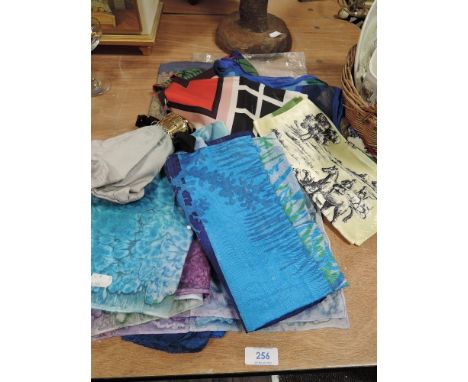 A selection of scarves including Radley,silk and vintage examples and a vintage evening bag.