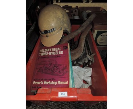 A mixed lot containing workshop manuals,a vintage helmet, twin 40 Weber carbs and more.
