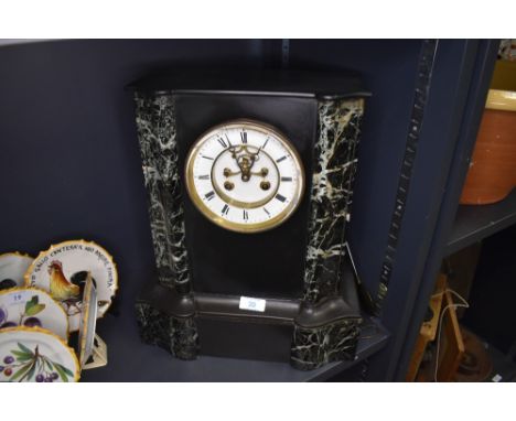 A late Victorian slate mantle or bracket clock of large size having marble base and column with enamel face