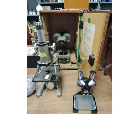 Six vintage microscopes including Opax and Prior.