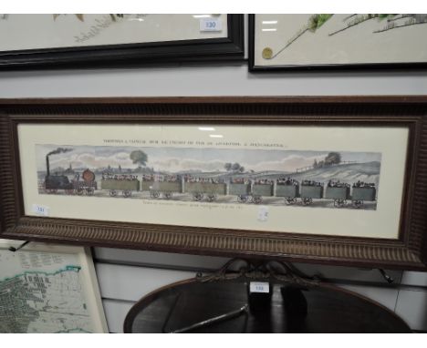 A French print of an early steam train in carved frame