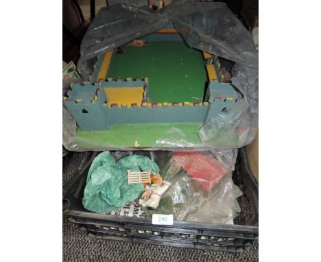 A vintage model fort and farm yard toys.