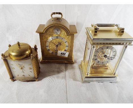 Two Swiza alarm clocks and a battery carriage clock (3) - £30 - £40