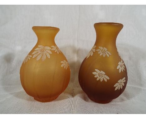 Two Okra glass vases decorated in the Days Eye Pearl pattern, designed by Sarah Cowan, both with original stickers to the bas