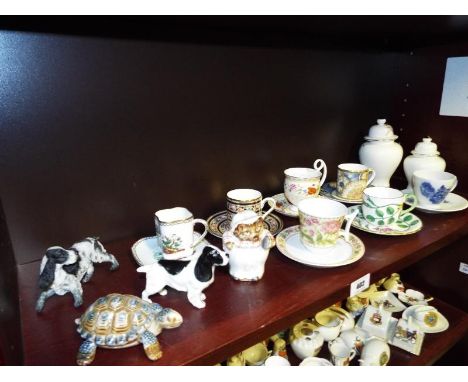 A quantity of cabinet pieces, cups and saucers, Royal Worcester, Royal Doulton, Copenhagen, two Beswick figurines, Beatrix Po