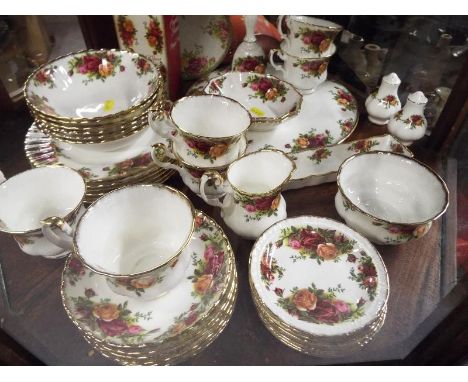 A Royal Albert tea service decorated in The Old Country Roses pattern comprising approximately 43 pieces