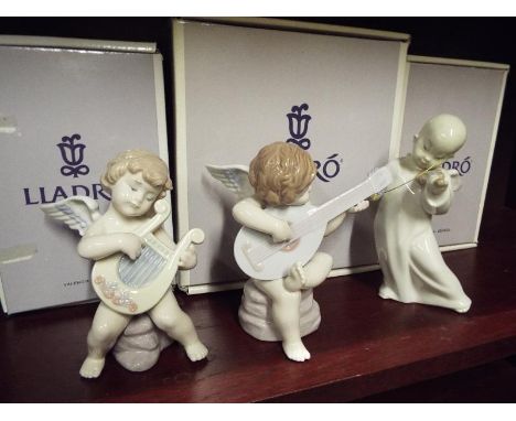 Three Lladro figures - Allegro Angelical # 06629, Adagio Angelical # 06628 and Angel Chino # 4.536 all in original boxes - (3