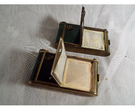 Two enameled novelty musical powder compacts, complete with lipstick case, mirror and cigarette holder - Est £50 - £80