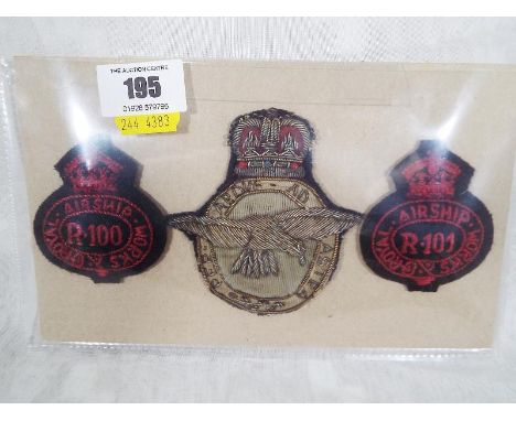 Three regimental patch badges