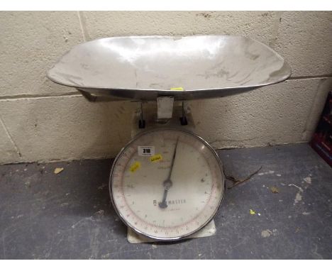 A vintage scale marked Weigh Master 