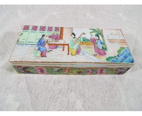 An Oriental ceramic trinket box hand painted with relief decoration, gilded highlights, 5cm x 21cm x 9cm