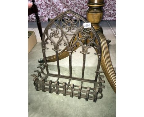 A wrought iron plant wall shelf with gothic arch backing, 48cm x 50cm x 19cm  