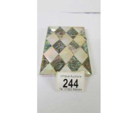 A mother of pearl and abalone card case.  