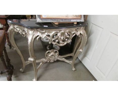 A console table with marble top. Total height 84cm, width at back 110cm 