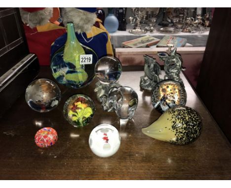 A Quantity of glass paperweights including Caithness.  