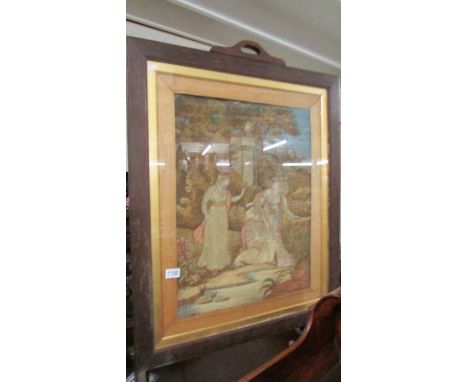 An oak firescreen with inset woolwork picture.  