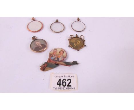 Two portrait pendants, three pendant mounts and a royalty badge.  