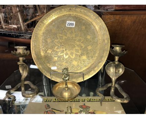 A brass Lincoln Imp candlestick, pair of brass Cobra candlesticks &amp; an Indian brass charger. Collect only.  