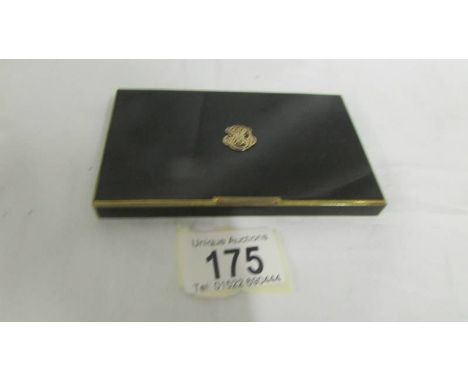 An art deco enamel and gilt box, monogram on lid, marks inside.  