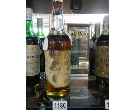 A bottle of Hull Brewery Old Scotch Whisky.  
