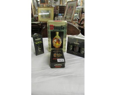 A boxed Dimple Scotch whisky and three miniature gift sets.  Collect only.  