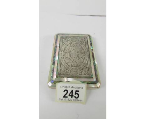 A silver and mother of pearl wallet type card case.*condition report*Outer case in good condition, silk lining worn patches i