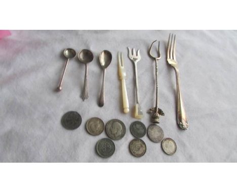 Five items of silver flatware including pickle forks, salt spoons etc., 33 grams.  13 grams of silver coins, a mother of pear