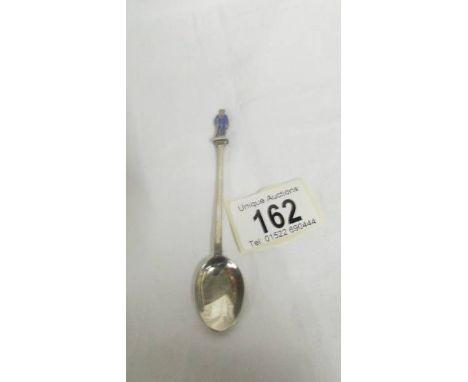 A liberty &amp; Co., silver spoon with commemorative first world war 'Injured soldier' finial, Hall marked for 1915.  