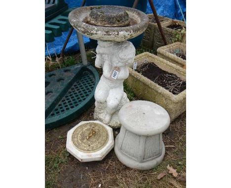 A cherub plinth bird bath, a mounted brass sundial and a plinth.  Collect only.  