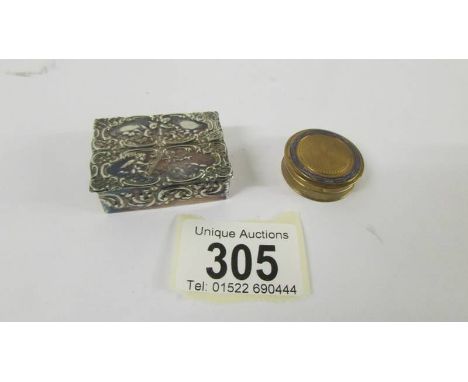 A silver circa 1977 pill box and a miniature engine turned powder compact.  