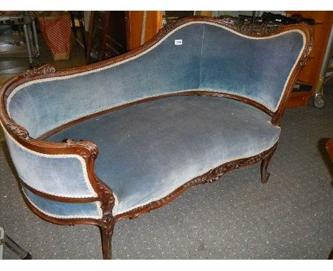 A mahogany framed Victorian sofa in blue.*condition report*Length 129cm, 1 rear leg needs attention 