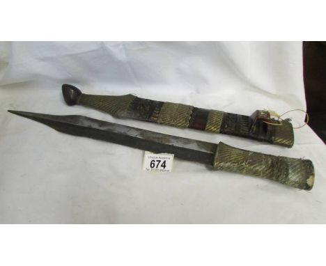 A rare dagger probably from the Shona tribe in Zimbabwe, correct name Shona Batakwa. Not a fighting weapon, more ceremonial*C