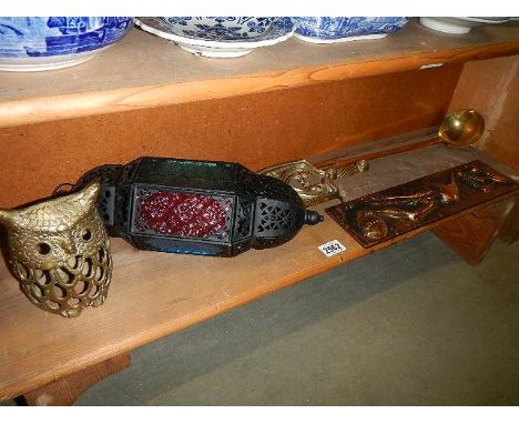 A mixed lot of brass and other items including iron tivet, tea light etc.,  