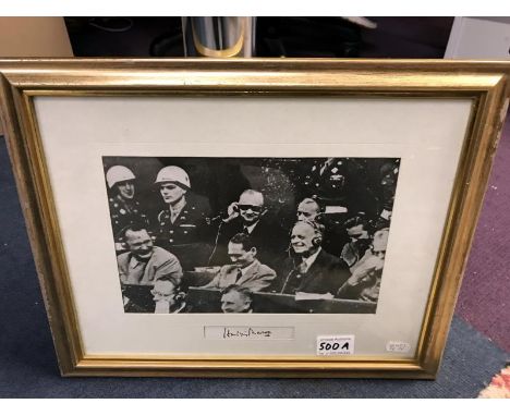 A framed photo print of the Nuremberg Trials with signatures of Lord Shawcross Chief British prosecutor at Nuremberg.