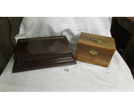 A mahogany tea caddy with brass fittings and another mahogany box.  
