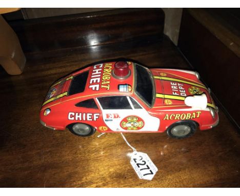 A Japanese tin plate battery operated acrobat fire chief Porsche 911 car (working)  