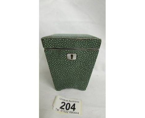 A shagreen tea caddy, possibly Chinese.  Top 8.5cm x 8.5cm.Bottom 5.5cm x 5.5cm.Height 19.75cm.