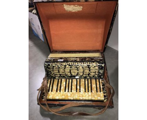 A cased Meridian piano accordion. (Collect only)  