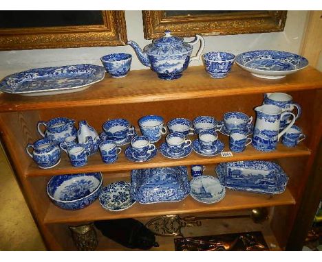 Two shelves of Spode, Enoch Wood etc., blue and white china.  