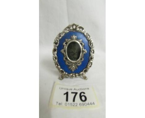 A late 19th/early 20th century white metal and blue guilloche enamel photograph frame, signed KF in Cyrillic for Karl Faberge