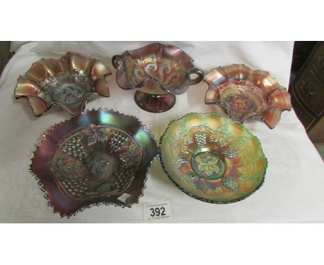 Five carnival glass bowls including Fenton green leaf, Dugan amethyst apple blossom, Northwood Grape &amp; cable, Question ma