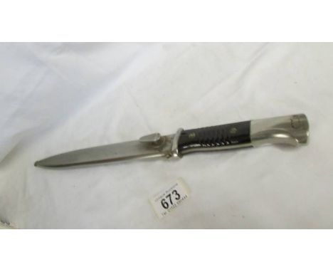 A WW2 German K98 Bayonet in scabbard, 1942, matching serial number 455.