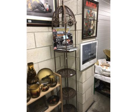 A wrought iron circular 4 shelf garden/ conservatory pot stand. Height 206cm x Diameter 33cm (COLLECT ONLY)*condition report*