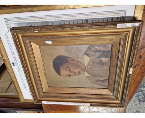 AN OIL PORTRAIT OF A BOY TOGETHER WITH A FRAMED MAP OF THE CARRIBEAN ISLANDS