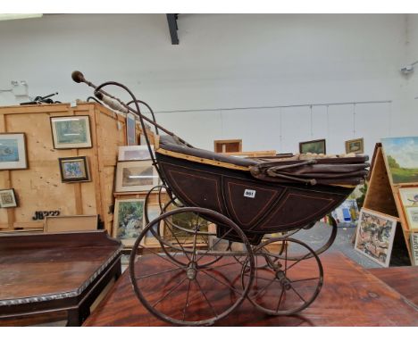 AN ALBERT YEATES DOLLS PRAM TOGETHER WITH AN IRON FIRE FORK