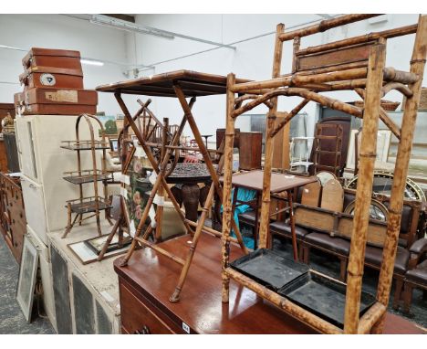 AN ANTIQUE BAMBOO MIRRORED FIRE SCREEN, A SIMILAR THREE TIER STAND, A STICK STAND, AND A LATER FOLDING TABLE. 