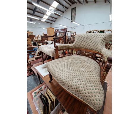 AN EDWARDIAN MARQUETRIED ROSEWOOD TUB ARMCHAIR ON CERAMIC CASTER FEET, TOGETHER WITH A REGENCY MAHOGANY ELBOW CHAIR WITH LINE